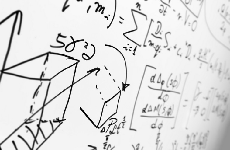 Complex math formulas on whiteboard. Mathematics and science with economics concept. Real equations, symbols handwritten by a professional.